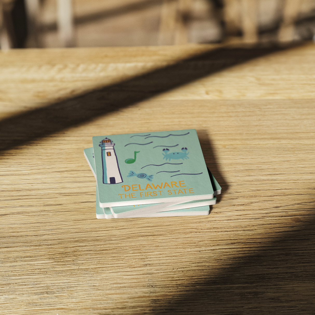 Stone_Coaster_-_Delaware_Landmarks_SquareStoneCoaster_WoodTable_AS_Mockup.png_15452495