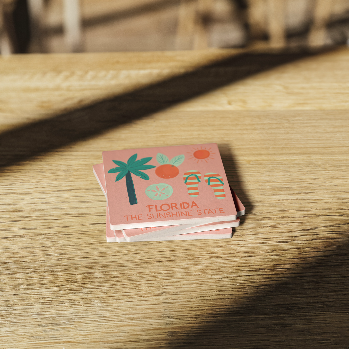 Stone_Coaster_-_Florida_Landmarks_SquareStoneCoaster_WoodTable_AS_Mockup.png_15452489