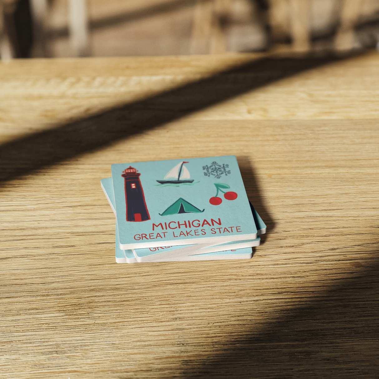 Stone_Coaster_-_Michigan_Landmarks_SquareStoneCoaster_WoodTable_AS_Mockup.png_15452668