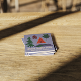 Stone_Coaster_-_Smoky_Mtn_NP_Landmarks_SquareStoneCoaster_WoodTable_AS_Mockup.png_15452642